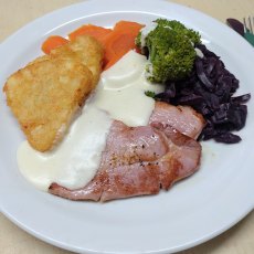 Gammon Steak Topped with Cheddar Cheese Sauce Gammon Steak Topped with Cheddar Cheese Sauce